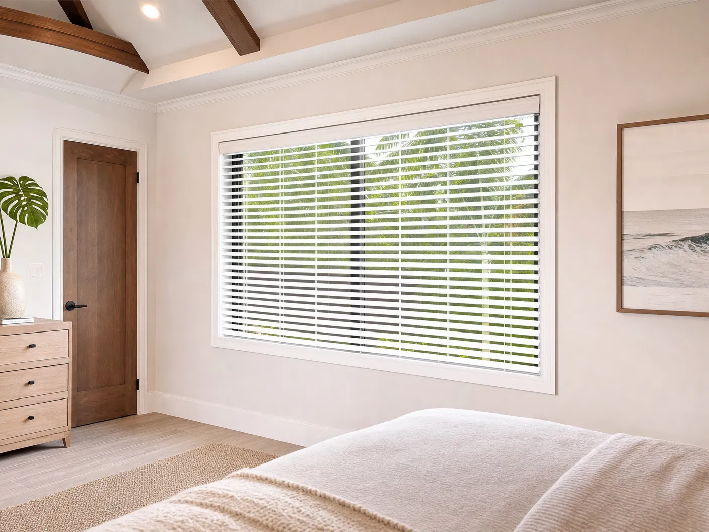 White horizontal blinds in a bright bedroom